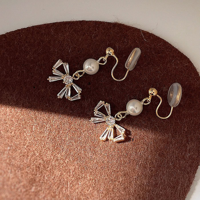 Bow Perlen Ohrclips mit Zirkonia