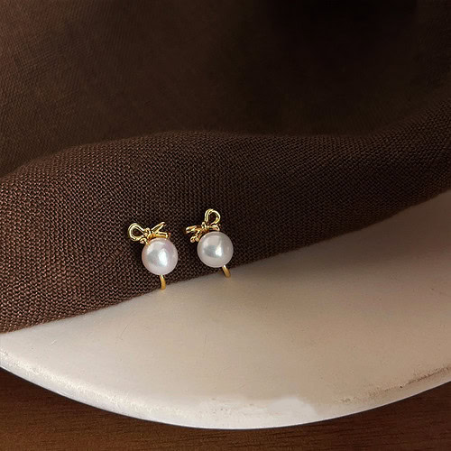 Gold Bow Ohrclips mit Perlen