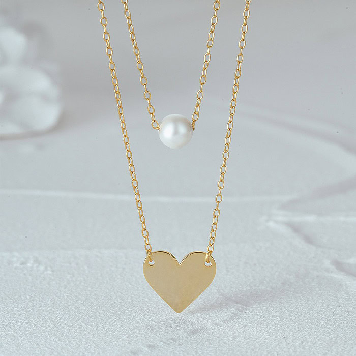 Damenkette mit Herz und Perlen