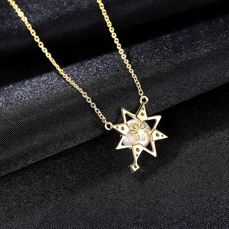 Goldene Saturn Kette mit Perle