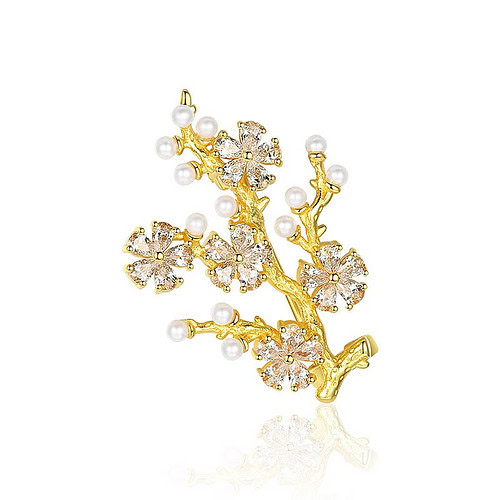 Goldene Brosche mit Perle
