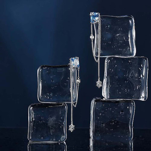 Schneeflocken Ohrringe mit Blaue Zirkonia