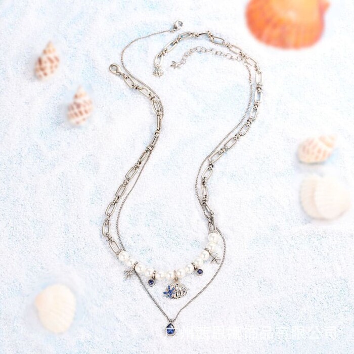 Layering Kette mit Muschel und Perlen