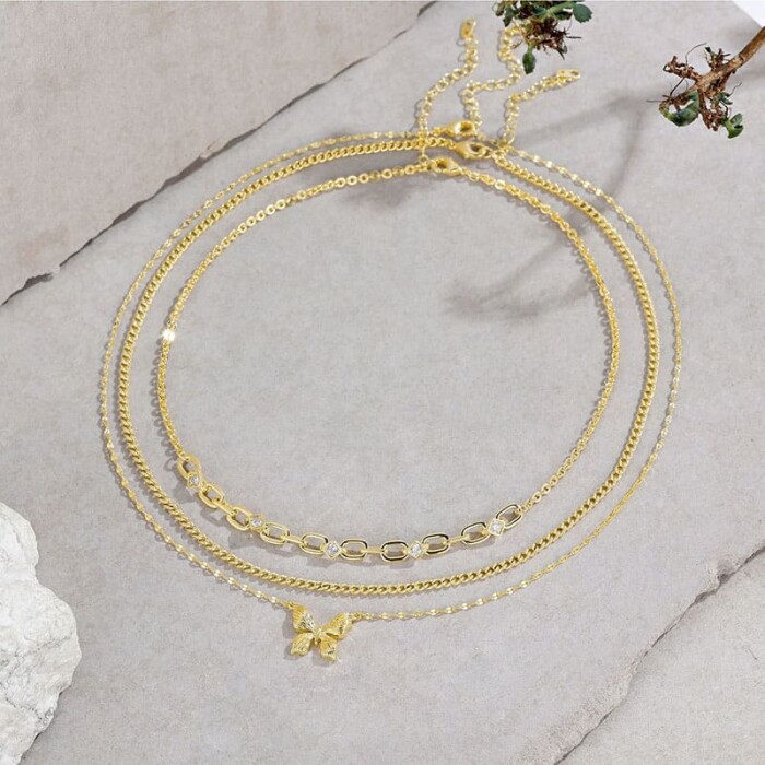 Goldene Layering Kette mit Schmetterling