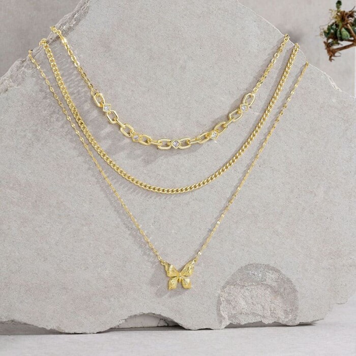 Goldene Layering Kette mit Schmetterling