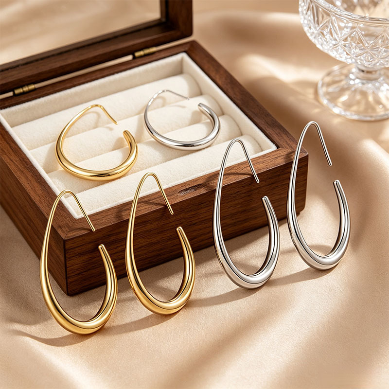Medizinische Tropfen-Creolen aus 316L Chirurgenstahl in Gold & Silber